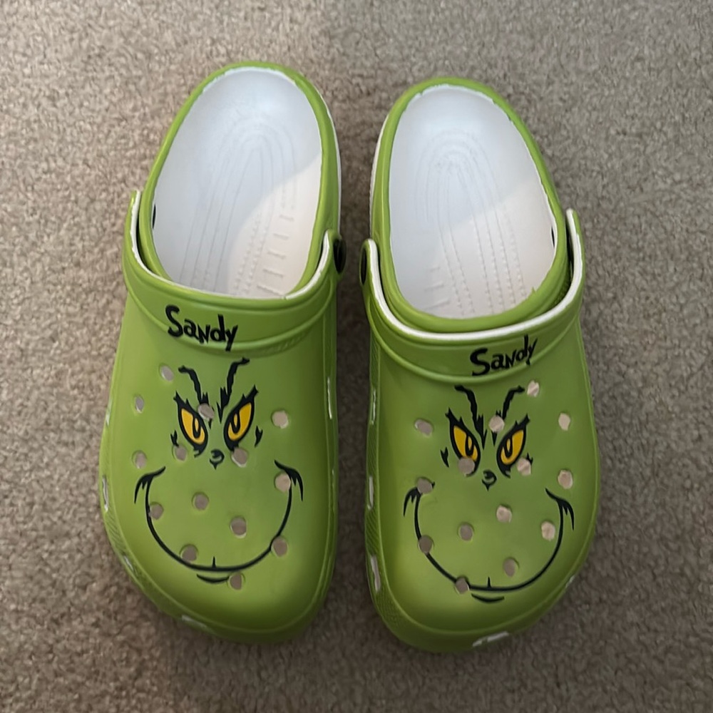 Grinch style croc like slides. Never worn as they sent the wrong name
